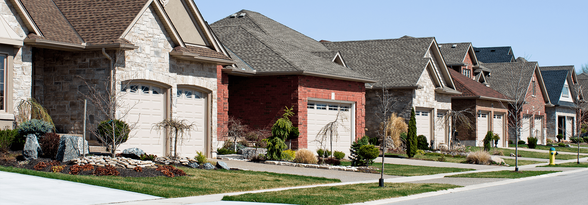 Image of the front of several houses on a residential street