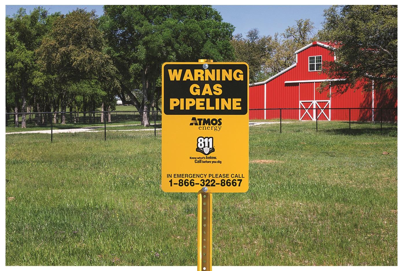 Image of a warning sign, "Warning Gas Pipeline"